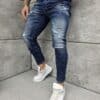 Мъжки сини Skinny fit дънки с разнищени кръпки-код 7118