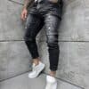 Мъжки черни Slim Fit дънки с дискретно накъсване-код 5593